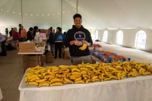 Volunteer handing out bananas at the Kidney Walk