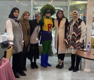 Zaman students with Regie in new costume