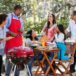 Photo of diverse family and friends at a BBQ.